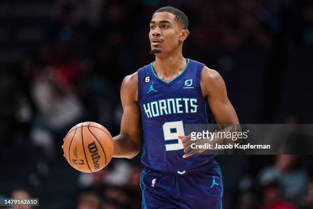 Theo Maledon of the Charlotte Hornets brings the ball up court against the Toronto Raptors during their game at Spectrum Center on April 02, 2023 in...