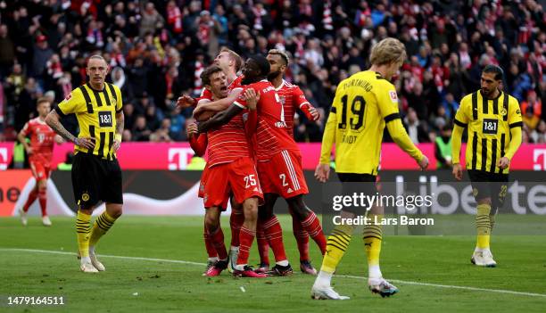 Thomas Mueller of Muenchen celebrates after scoring his teams second goal during the Bundesliga match between FC Bayern München and Borussia Dortmund...