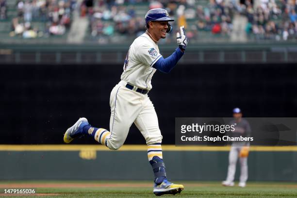 Julio Rodriguez of the Seattle Mariners celebrates his home run during the first inning against the Cleveland Guardians at T-Mobile Park on April 02,...