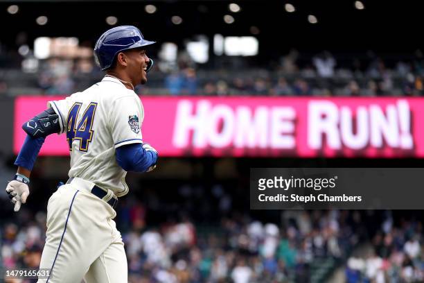 Julio Rodriguez of the Seattle Mariners celebrates his home run during the first inning against the Cleveland Guardians at T-Mobile Park on April 02,...