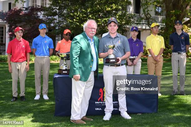 Craig Stadler poses with second place overall Joseph Morinelli of the Boys 14-15 group during the Drive, Chip and Putt Championship at Augusta...