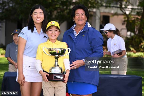 Winner Rose Zhang and Nancy Lopez pose with Asjley Kim othe girls 7-9 group during the Drive, Chip and Putt Championship at Augusta National Golf...