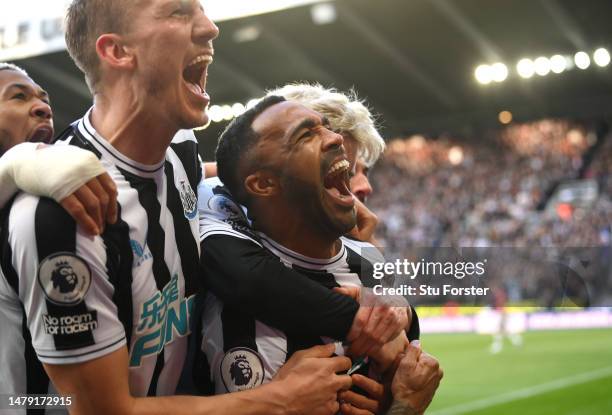 Newcastle striker Callum Wilson celebrates with team mates after scoring the second Newcastle goal during the Premier League match between Newcastle...