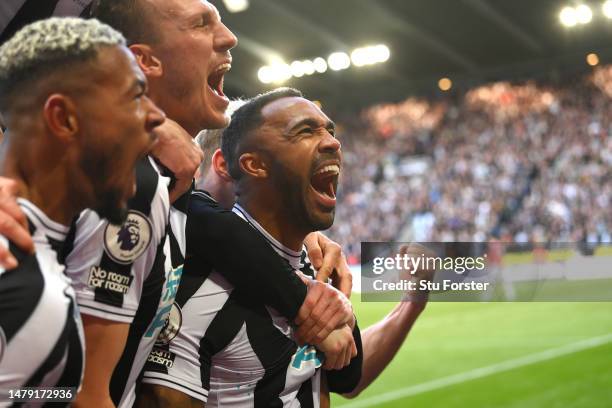 Newcastle striker Callum Wilson celebrates with team mates after scoring the second Newcastle goal during the Premier League match between Newcastle...