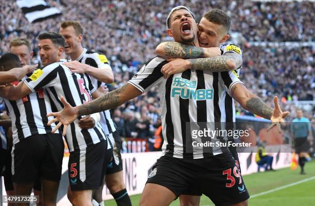 Newcastle player Bruno Guimaraes celebrates with Kieran Trippier after the first Newcastle goal during the Premier League match between Newcastle...