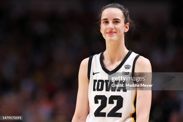 Caitlin Clark of the Iowa Hawkeyes reacts during the second half against the LSU Lady Tigers during the 2023 NCAA Women's Basketball Tournament...