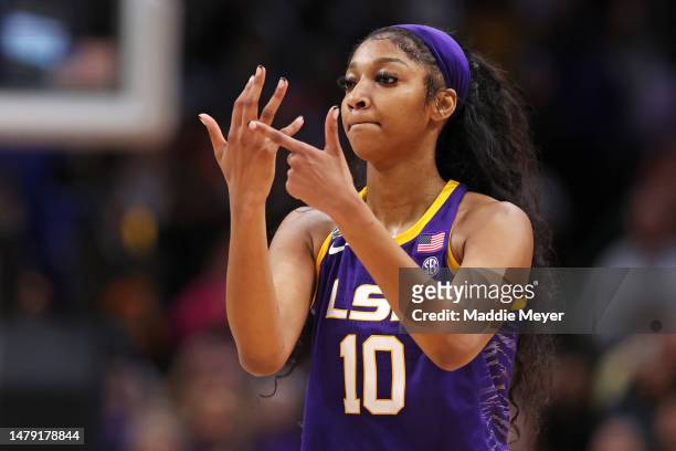 Angel Reese of the LSU Lady Tigers reacts during the fourth quarter against the Iowa Hawkeyes during the 2023 NCAA Women's Basketball Tournament...