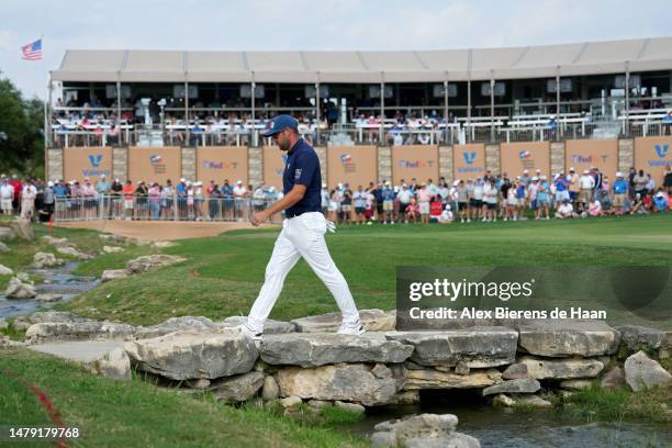 Corey Conners of Canada walks across the 18th hole during the final round of the Valero Texas Open at TPC San Antonio on April 02, 2023 in San...