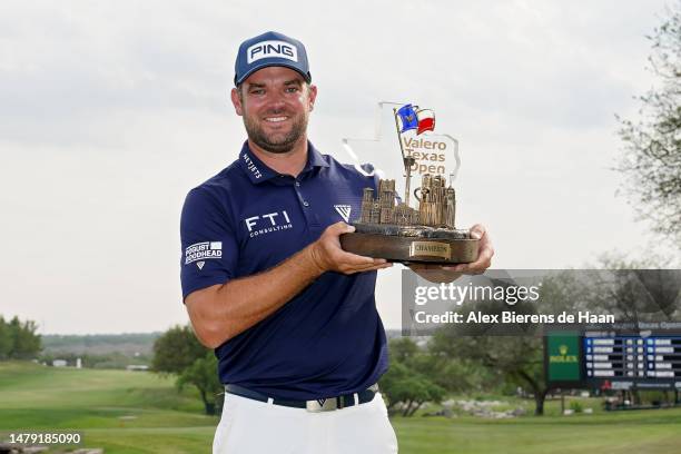 Corey Conners of Canada poses with the trophy after winning the Valero Texas Open at TPC San Antonio on April 02, 2023 in San Antonio, Texas.