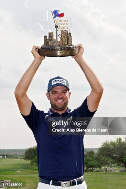 Corey Conners of Canada poses with the trophy after winning the Valero Texas Open at TPC San Antonio on April 02, 2023 in San Antonio, Texas.