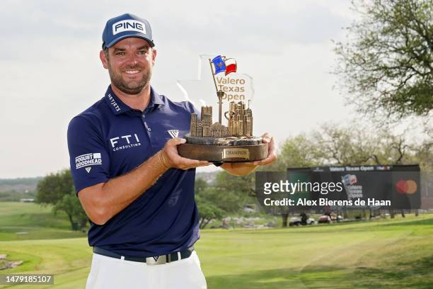 Corey Conners of Canada poses with the trophy after winning the Valero Texas Open at TPC San Antonio on April 02, 2023 in San Antonio, Texas.