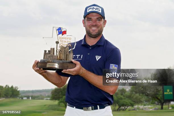 Corey Conners of Canada poses with the trophy after winning the Valero Texas Open at TPC San Antonio on April 02, 2023 in San Antonio, Texas.