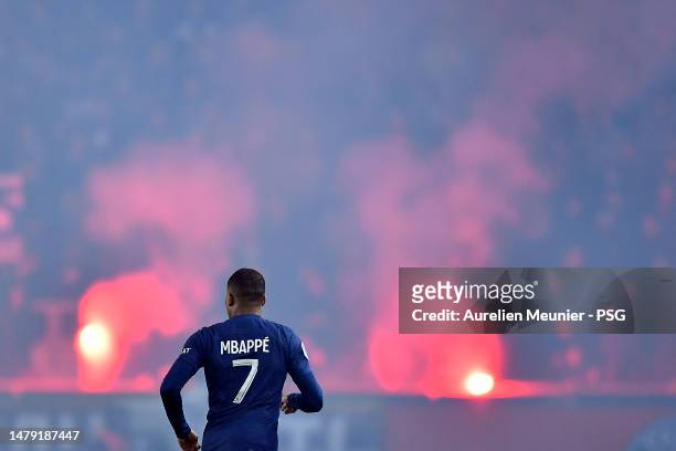 Kylian Mbappe of Paris Saint Germain looks on during the Ligue 1 match between Paris Saint-Germain and Olympique Lyon at Parc des Princes on April...