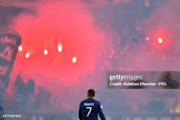 Kylian Mbappe of Paris Saint Germain looks on during the Ligue 1 match between Paris Saint-Germain and Olympique Lyon at Parc des Princes on April...