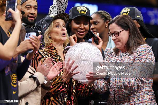 Head coach Kim Mulkey of the LSU Lady Tigers reacts after defeating the Iowa Hawkeyes 102-85 during the 2023 NCAA Women's Basketball Tournament...