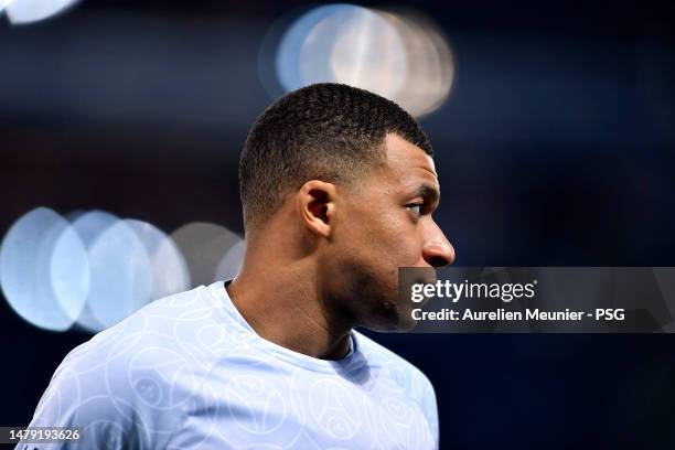 Kylian Mbappe of Paris Saint Germain warms up before the for the Ligue 1 match between Paris Saint-Germain and Olympique Lyon at Parc des Princes on...