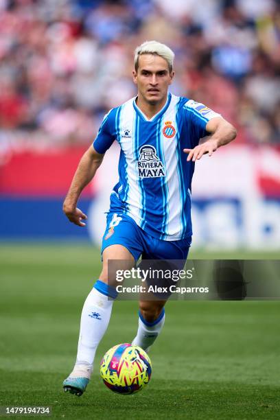 Denis Suarez of RCD Espanyol runs with the ball during the LaLiga Santander match between Girona FC and RCD Espanyol at Montilivi Stadium on April...