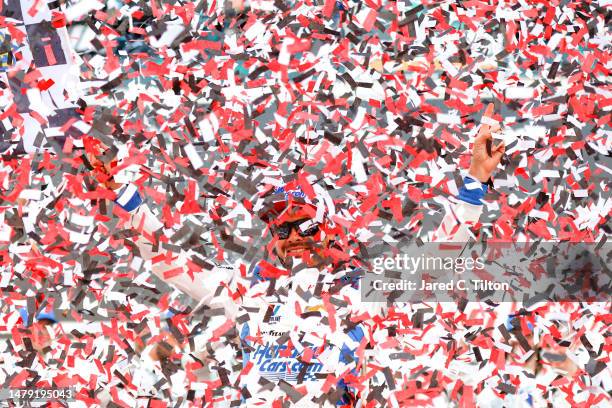 Kyle Larson, driver of the HendrickCars.com Chevrolet, celebrates in victory lane after winning the NASCAR Cup Series Toyota Owners 400 at Richmond...