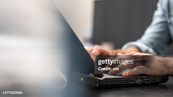 Man hands typing on laptop keyboard Man hands typing on laptop keyboard