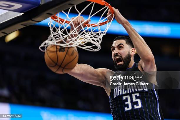 Goga Bitadze of the Orlando Magic dunks the ball during the second half of a game against the Detroit Pistons at the Amway Center on April 02, 2023...