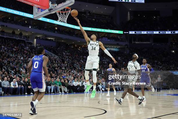 Giannis Antetokounmpo of the Milwaukee Bucks takes a shot during the first half of a game against the Philadelphia 76ers at Fiserv Forum on April 02,...