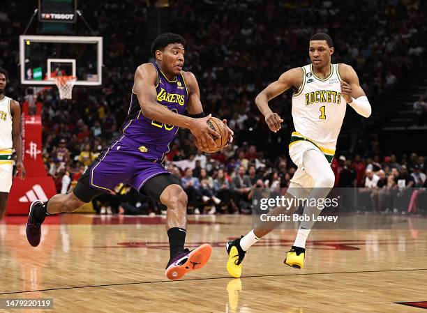 Rui Hachimura of the Los Angeles Lakers runs up the court as Jabari Smith Jr. #1 of the Houston Rockets pursues during the fourth quarter at Toyota...