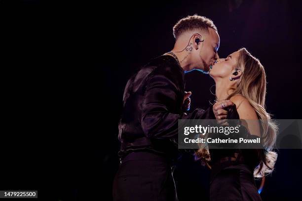 In this image released on April 02, Kane Brown and Katelyn Jae Brown perform onstage for the 2023 CMT Music Awards at Moody Center on March 29, 2023...