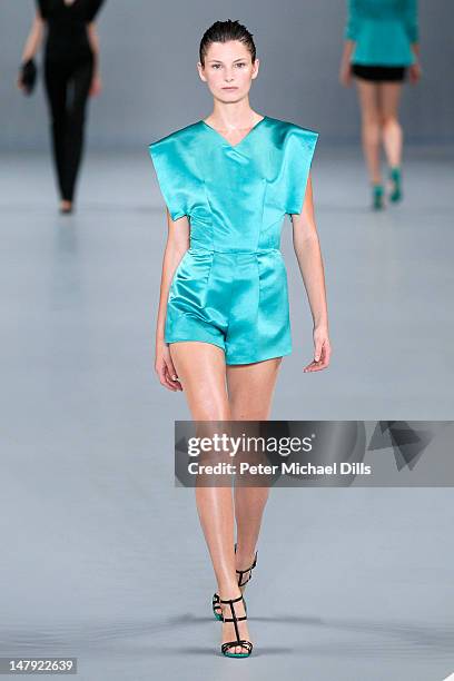 Model walks the runway at the Hugo by Hugo Boss fashion show on July 5, 2012 in Berlin, Germany.