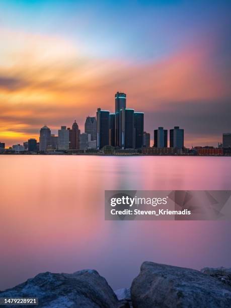 detroit, michigan - skyline at dusk - windsor canada stock pictures, royalty-free photos & images