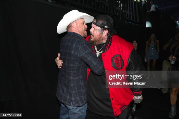 Cody Johnson congratulates Jelly Roll for winning the Male Video of the Year Award at the 2023 CMT Music Awards at Moody Center on April 02, 2023 in...