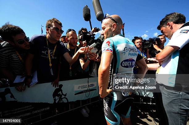Levi Leipheimer of the USA riding for Omega Pharma-Quickstep speaks to members of the media during stage five of the Tour de France between Rouen and...