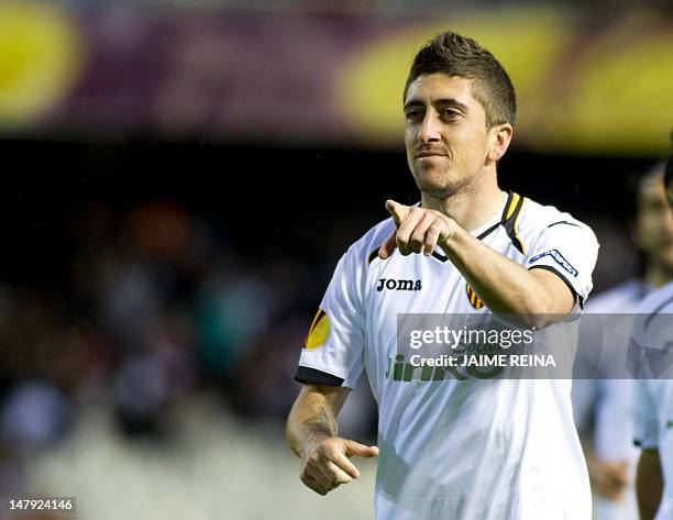 Valencia's midfielder Pablo Hernandez Dominguez celebrates during the UEFA Europa League quarter-final second leg football match between Valencia and...