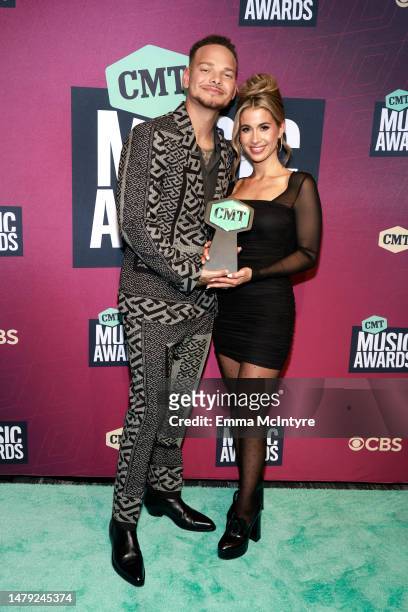 Kane Brown and Katelyn Jae Brown, winners of Video of the Year award for “Thank God,” pose in the Winner's Circle during the 2023 CMT Music Awards at...