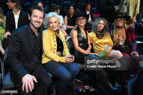 Ian Bohen, Jennifer Landon, Mandelyn Monchick and Lainey Wilson attend the 2023 CMT Music Awards at Moody Center on April 02, 2023 in Austin, Texas.