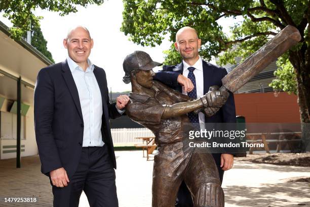 Cricket Australia CEO Nick Hockley and Australian Cricketers' Association CEO Todd Greenberg pose next to the Belinda Clarke sculpture following a...