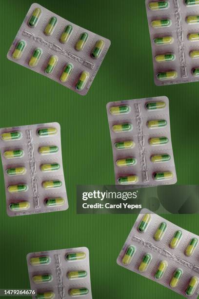 natural blister packs of pills in  white background - blister pack stock-fotos und bilder