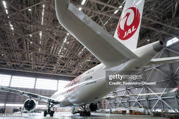 An Airbus A350 airplane for Japan Airlines sits parked during an entrance ceremony in a hangar at Haneda Airport on April 03, 2023 in Tokyo, Japan....