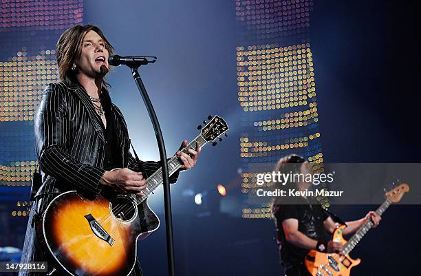 Musicians Johnny Rzeznik and Robby Takac of the Goo Goo Dolls onstage at the Andre Agassi 12th Annual Grand Slam for Children at the MGM Grand Garden...