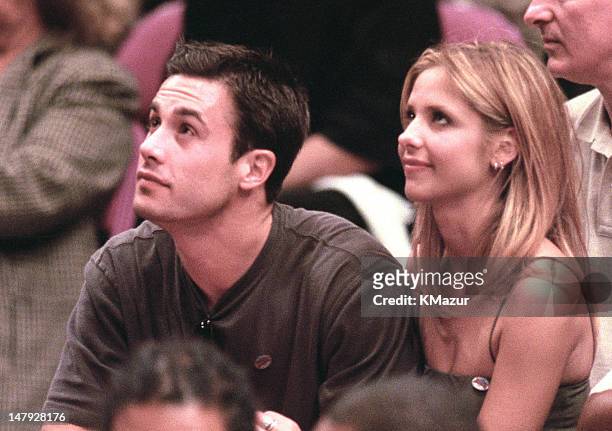 Sarah Michelle Gellar and Freddie Prinze Jr. During New York Knicks Vs. The Miami Heat in the NBA playoffs May 14th 2000 at Madison Square Garden in...