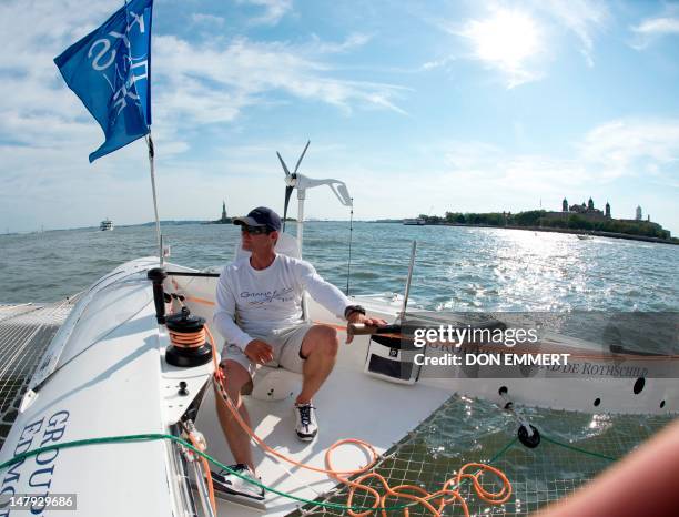 Skipper Sebastian Josse races aboard Groupe Edmond De Rothchild in the KRYS Ocean Race with the Staute of Liberty in the background on July 5, 2012...