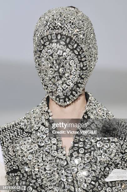 Model walks the runway during the Martin Margiela Haute Couture Fall Winter 2012-2013 show as part of the Paris Haute couture Week on July 4, 2012 in...