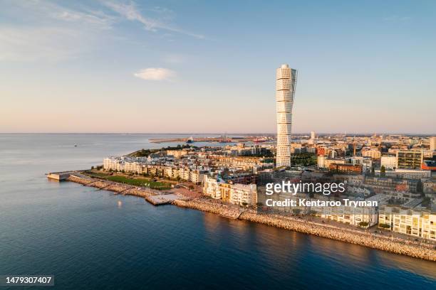 aerial view of a modern residential area by the sea. - malmo sweden stock pictures, royalty-free photos & images