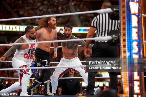 Kevin Owens and Sami Zayn wrestle The Usos for the Undisputed WWE tag team championship during WrestleMania 39 at SoFi Stadium on April 01, 2023 in...