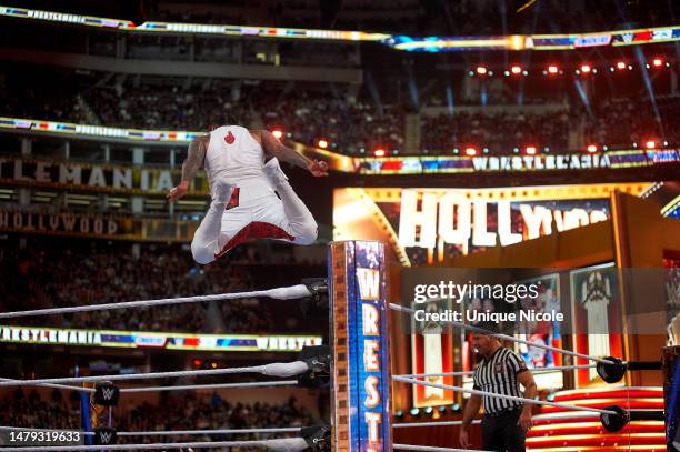 Kevin Owens and Sami Zayn wrestle The Usos for the Undisputed WWE tag team championship during WrestleMania 39 at SoFi Stadium on April 01, 2023 in...