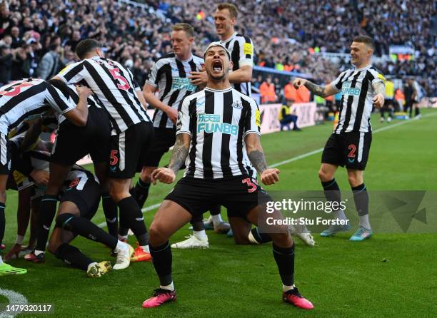 Bruno Guimaraes of Newcastle United celebrates after teammate Joe Willock scores the teams first goal during the Premier League match between...