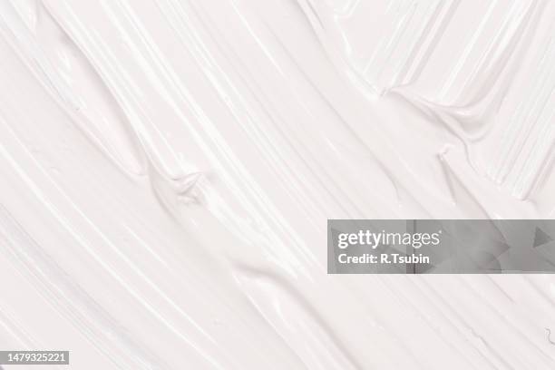 hand made oil paint brush stroke splash over the white paper as a design element of a backdrop - collant description physique photos et images de collection