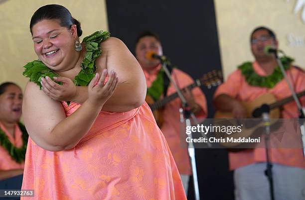 Loke Fergerstrom preforms with the University of Hawaii's Tuahine Troupe at the annual Smithsonian Folklife Festival on the Mall. One of this year's...