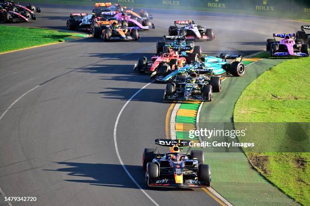 Max Verstappen of the Netherlands driving the Oracle Red Bull Racing RB19 leads Lewis Hamilton of Great Britain driving the Mercedes AMG Petronas F1...