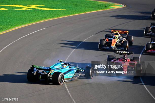 Fernando Alonso of Spain driving the Aston Martin AMR23 Mercedes spins after a collision at the second restart during the F1 Grand Prix of Australia...