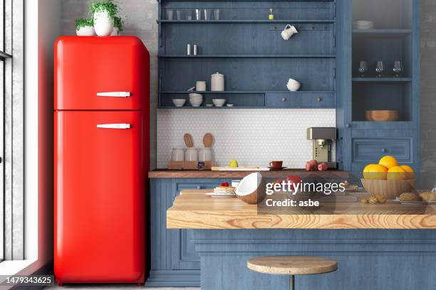 cozy retro kitchen interior with a red fridge - red fridges stockfoto's en -beelden